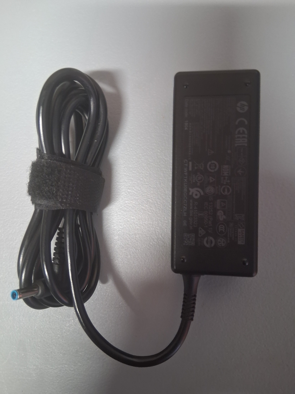 HP 45W 19.5V AC Power Adapter with Blue-Tip Connector, Model No. R-41013323.